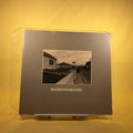 Photographs by Raymond Moore (Murmurs at Every Turn)